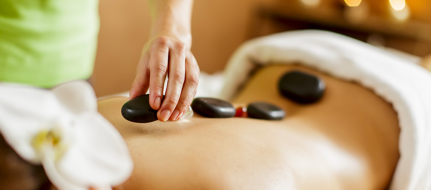 Massage aux Pierres chaudes de 60 minutes - 1 ou 3 séances 