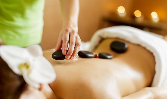 Massage aux Pierres chaudes de 60 minutes - 1 ou 3 séances 